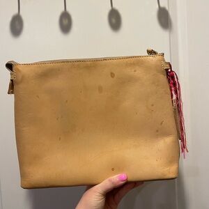 Consuela Tan Crossbody Bag with Pink Tassel